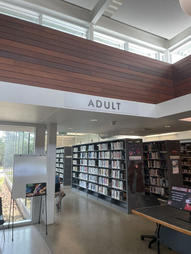 Teen parent at Oak Forest Library receiving free tutoring