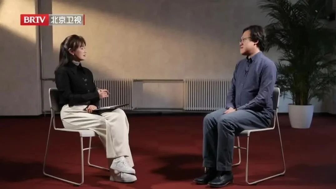 Beijing TV interviews founder Yuxiang Yan