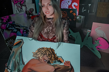 Abbey Pierson Studio Artist at Backroom Velvet Python Flaming Serpent holding art canvases