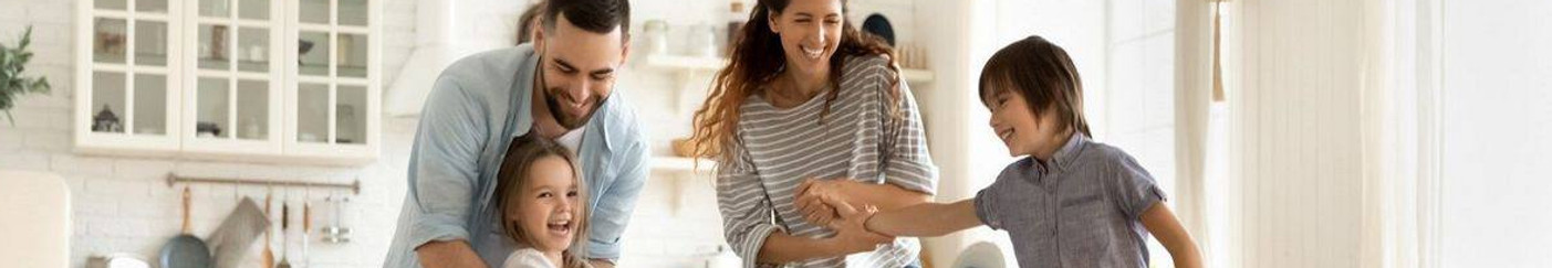 Happy family at home enjoying a clean space after recurring cleaning