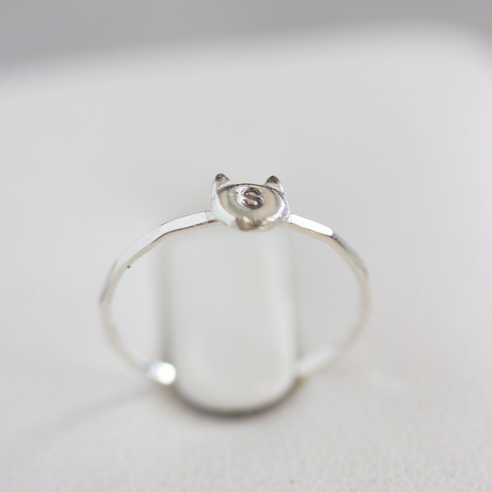 Thumbnail: Initial ring with hand stamping in a cat head shape