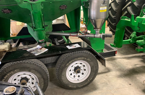 Changing Times 6 gallon 12v dry applicator & auger mounted on a Patriot Seed Tender.