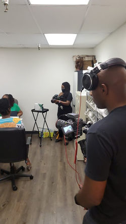 Our CEO using her skills as a videographer