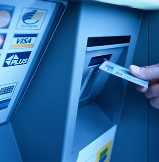 hand-putting-card-into-atm-6040-025226-59502cce3df78cae81e3d9b8.jpg