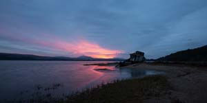 Red Sunset, a dilapidated ship ran aground
