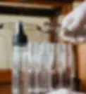 Glass vials being diluted with medicine.