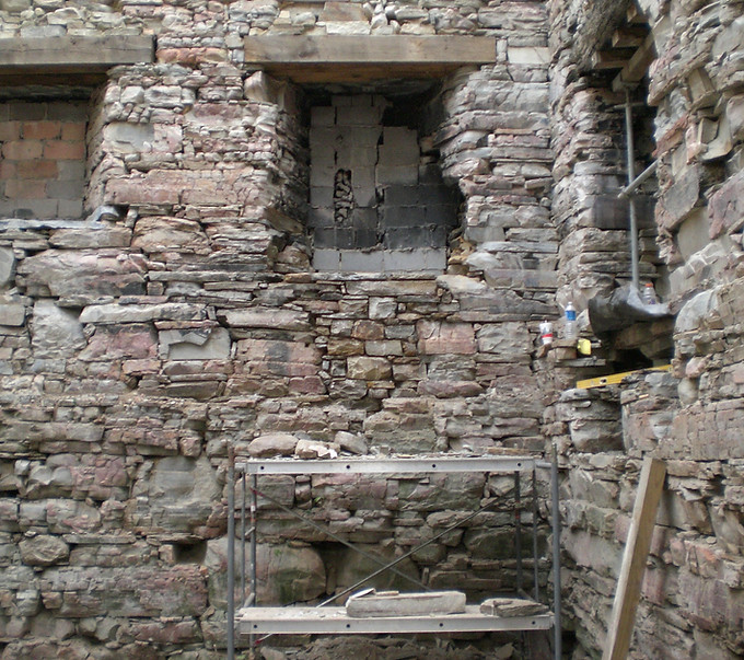 Masonry restoration of historic mill stone