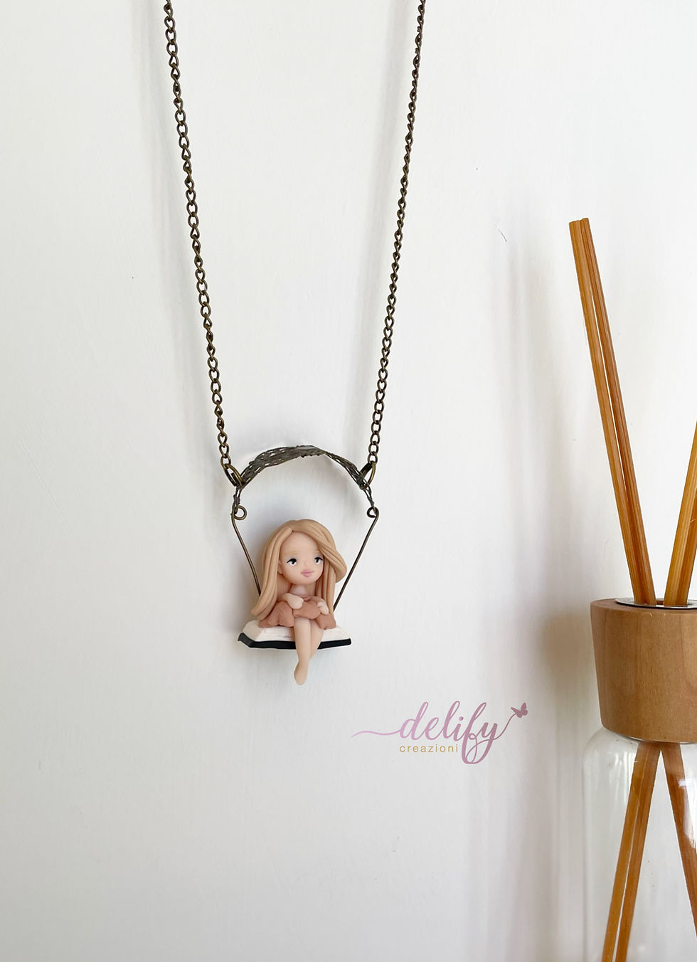 Miniatura: Collana Altalena con Bambolina 