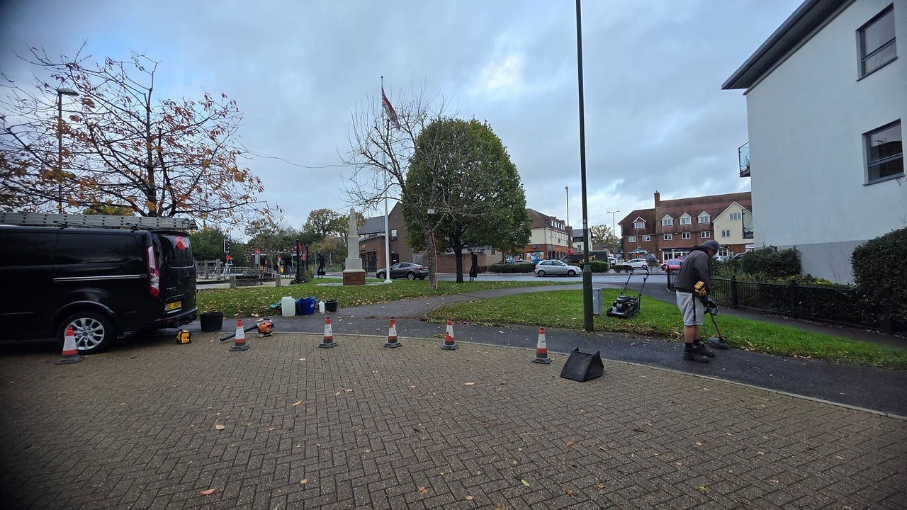 Orange cones around the War Memorial area, whilst it's being cleaned.