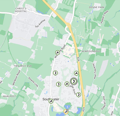 Map of Southwater area showing roads, landmarks, and green spaces. Icons indicate various points of interest along major routes.