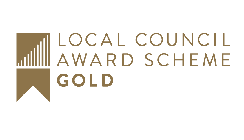 Gold logo of Local Council Award Scheme with vertical bars and a ribbon design on white background.