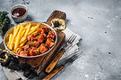 traditional-german-currywurst-sausage-served-with-2023-11-27-04-49-46-utc.jpg