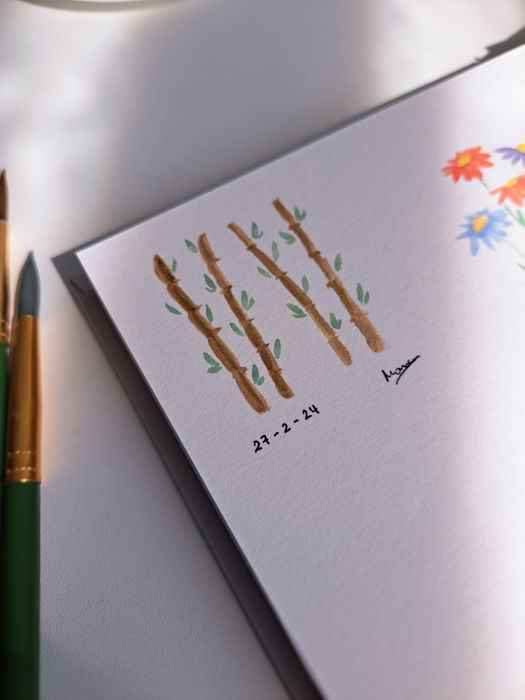 Flores pintadas en acuarela en papel de acuarela de un bocetero