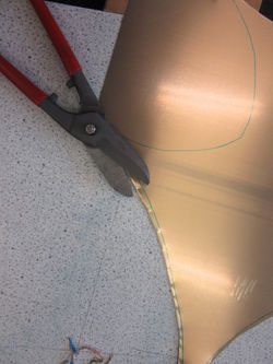 II Cut copper with tin snips