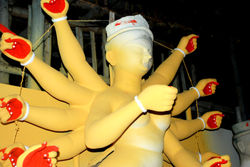 Making of the Devi's Idol : The idols are drying before the finishing touches