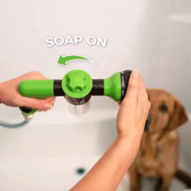 Thumbnail: Dog bathing sprayer with a high-pressure nozzle, for cleaning and grooming pets.