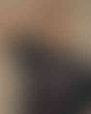 Woman smiling wearing Spider-Man shirt with text and logo. Snapchat logo.