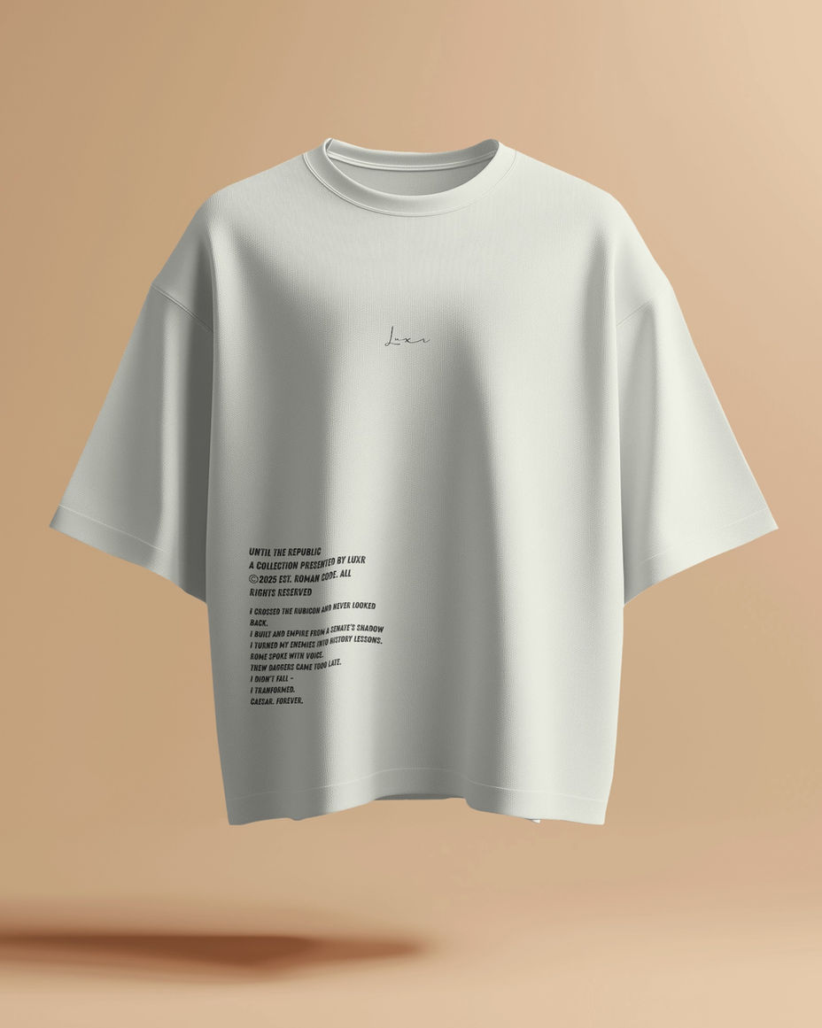 White t-shirt with black text and a small logo. Reads: