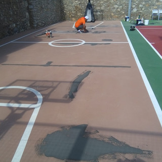 Trabajo reparación pista de minibasket .jpeg