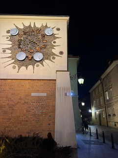 clock on a wall at night