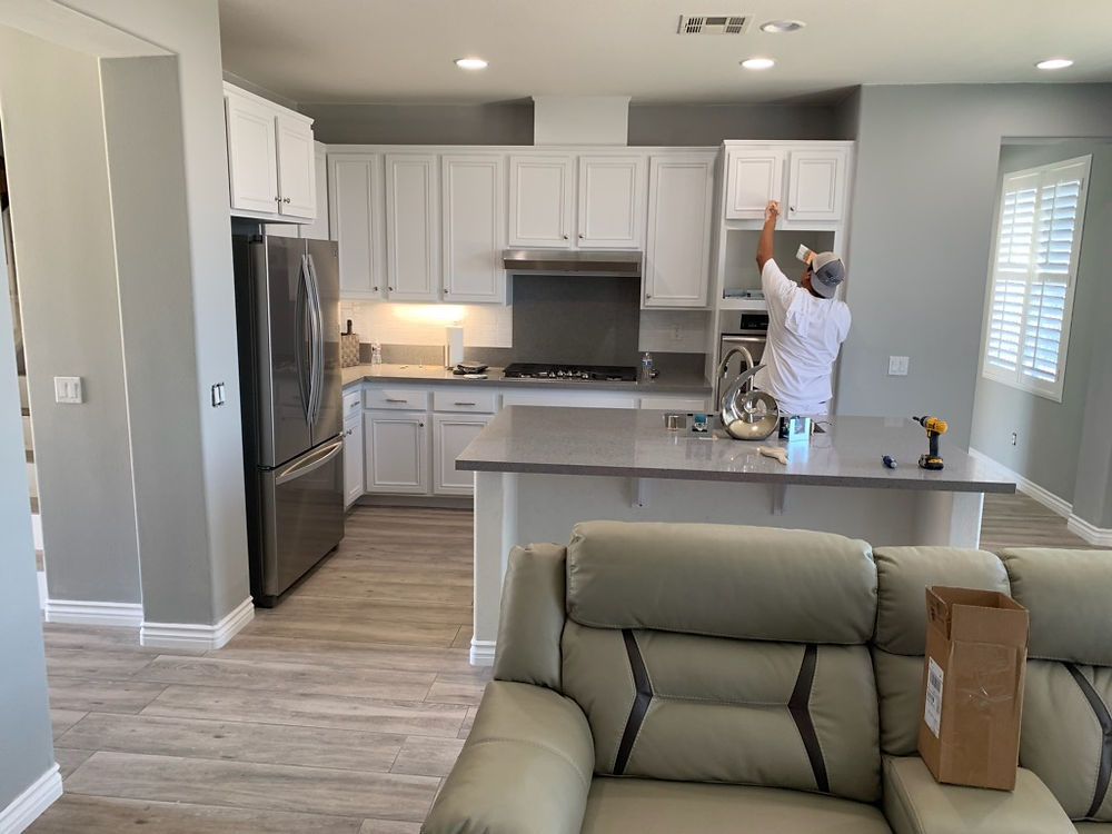 light gray kitchen cabinets in a modern kitchen; kitchen-cabinet-refacing-carlsbad