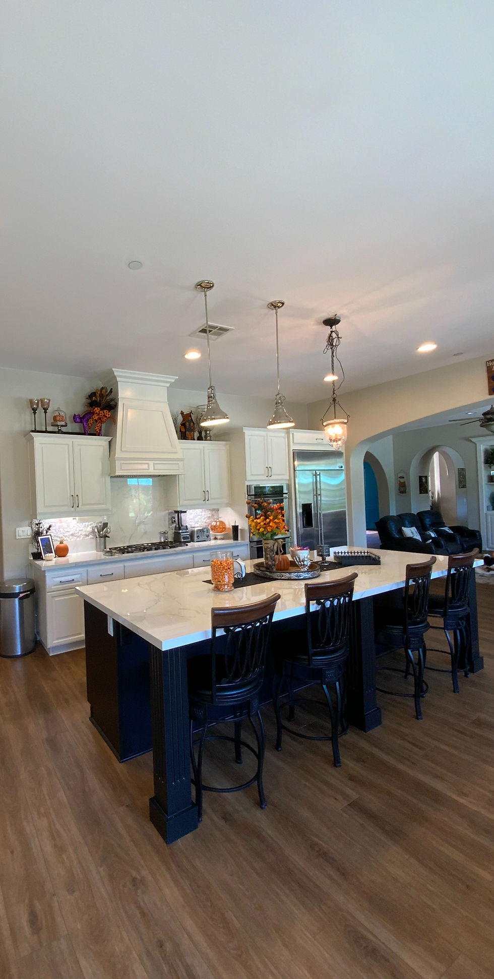 Modern kitchen island with light cabinets, a completed project. kitchen-cabinet-refinishing-valley center