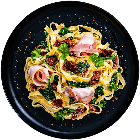 Asian noodles on a round black plate