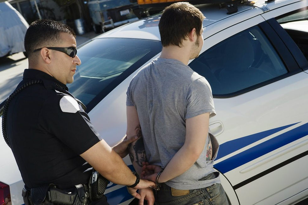 Police-arresting-young-man-1024x682-3211870943.jpg