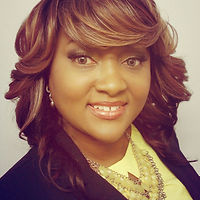 KM Headshot - Suit with Yellow.jpg