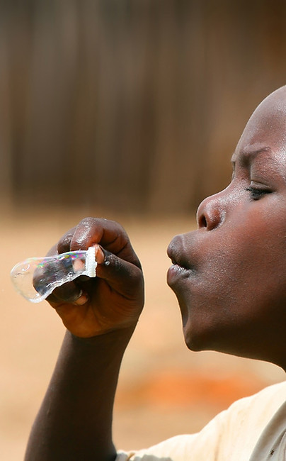 Boy Blowing Bubbles