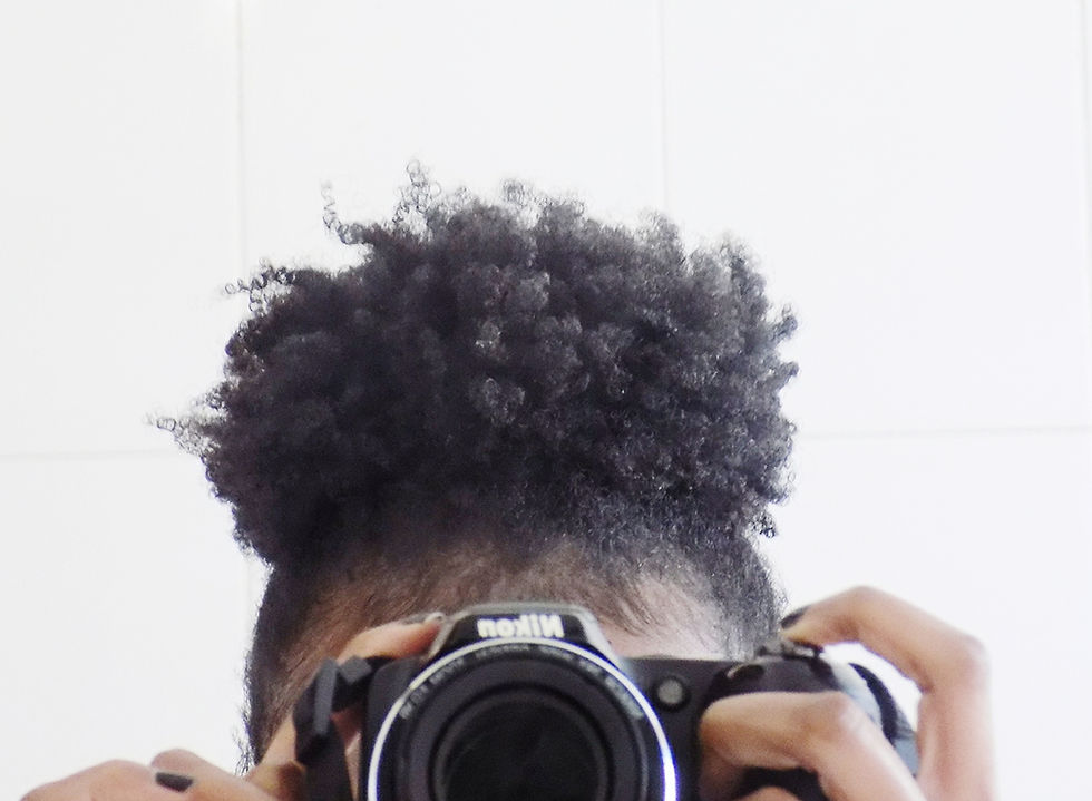 Caring for coily hair : My hair in a puff