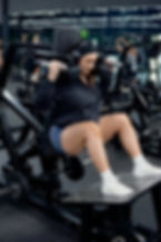 DFYNE athlete in dynamic shorts working out in the gym