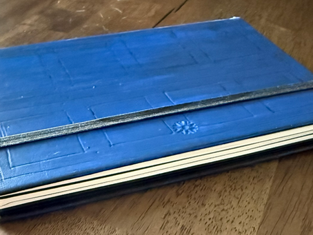 river song's diary closed on top of a table