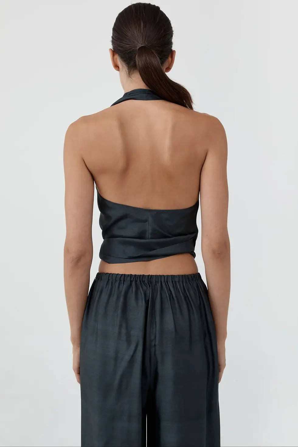 תמונה ממוזערת: ST AGNI - Silk Halter Wrap Top in Washed Black