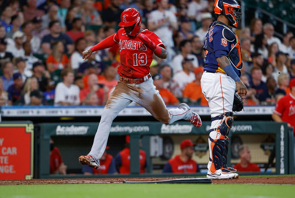 Monte Harrison scores a run