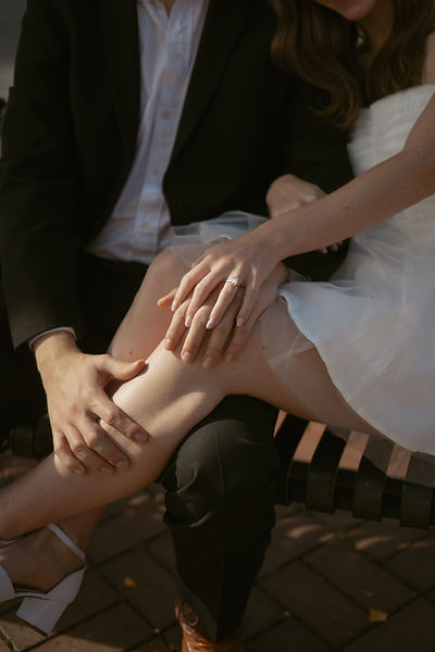 couple sitting on a park bench