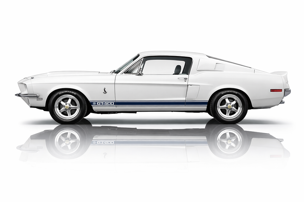 White 1968 Shelby GT500 profile with blue racing stripes