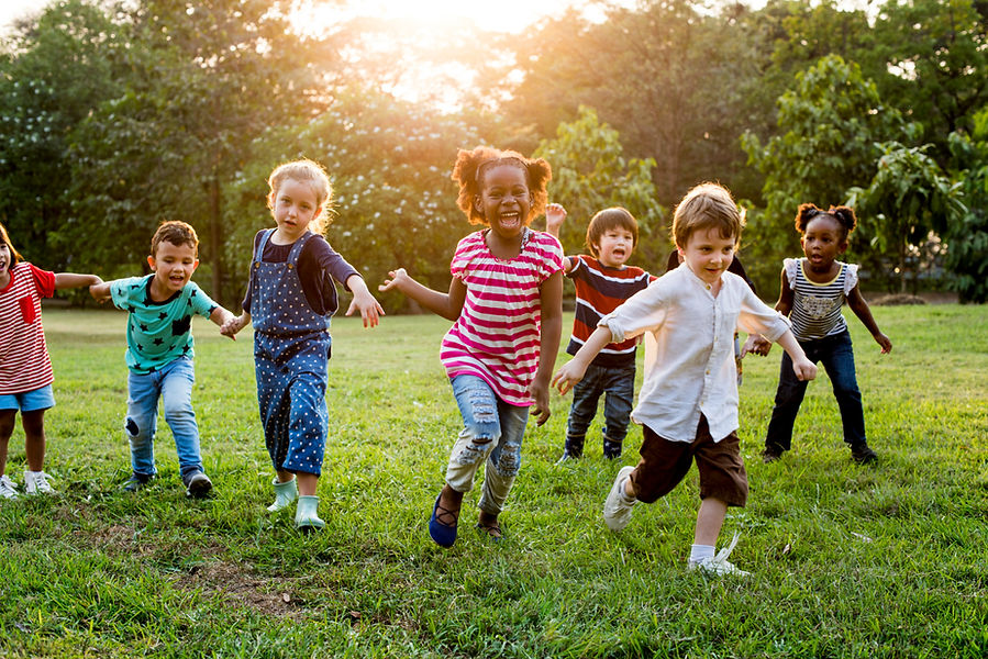 group-diverse-kids-playing-field-together.jpg