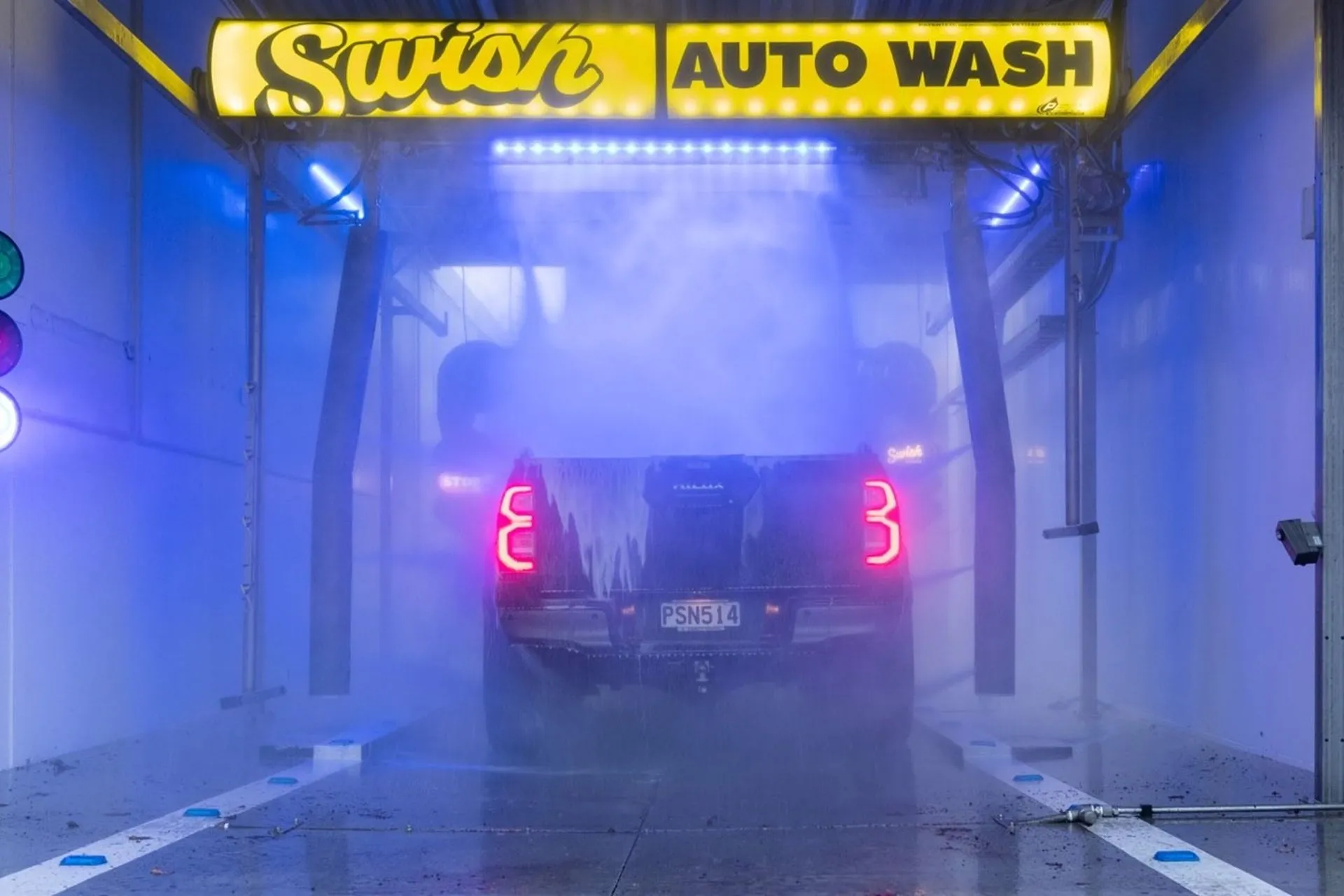 Car in auto wash at Petit Auto Wash Equipment