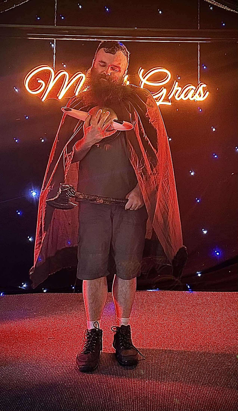Contestant on stage at the Mr Cub UK Competition
