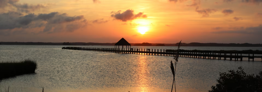 Ocean City sunset over a pier and water