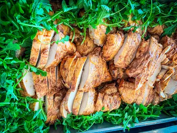 Sliced chicken with fresh greens for your Fort Myers event venue