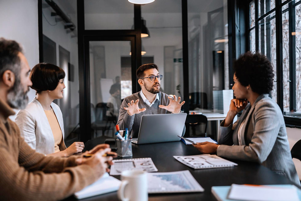 Team collaborating on AI strategy consulting in a meeting.