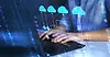 Person using laptop, cloud computing network