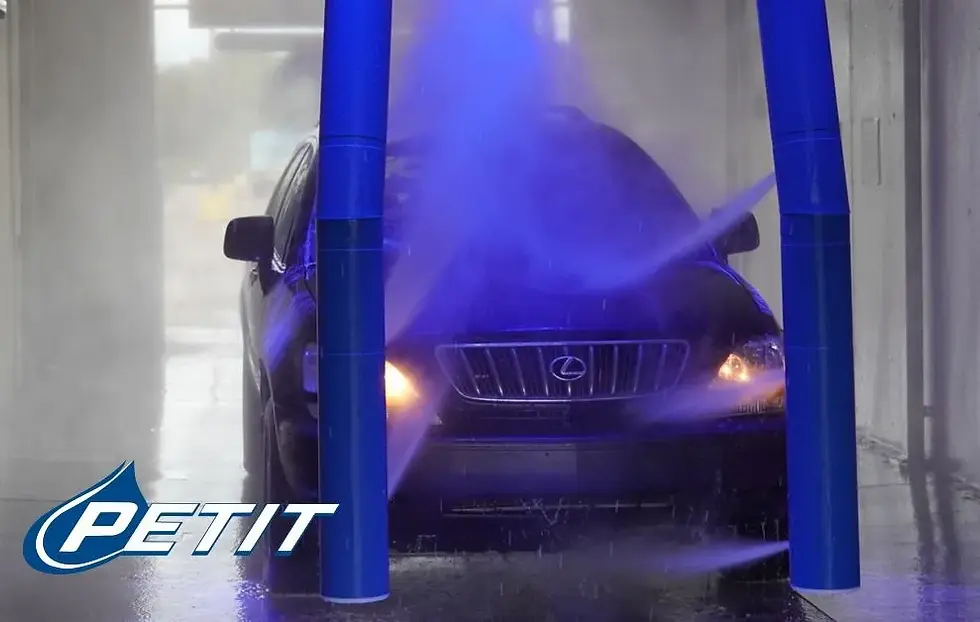 Car being washed at Petit Auto Wash Equipment