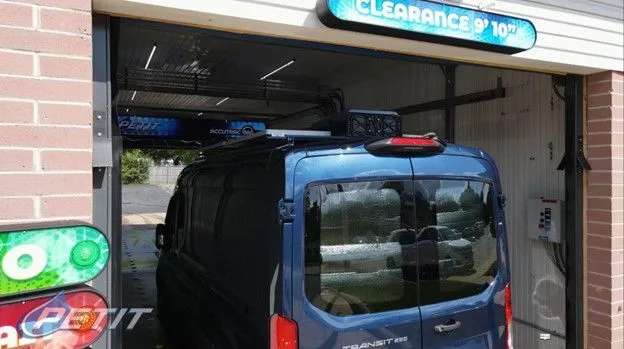 Car entering a car wash at Petit Auto Wash Equipment
