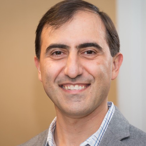 Portrait of an executive at an AI innovation company.