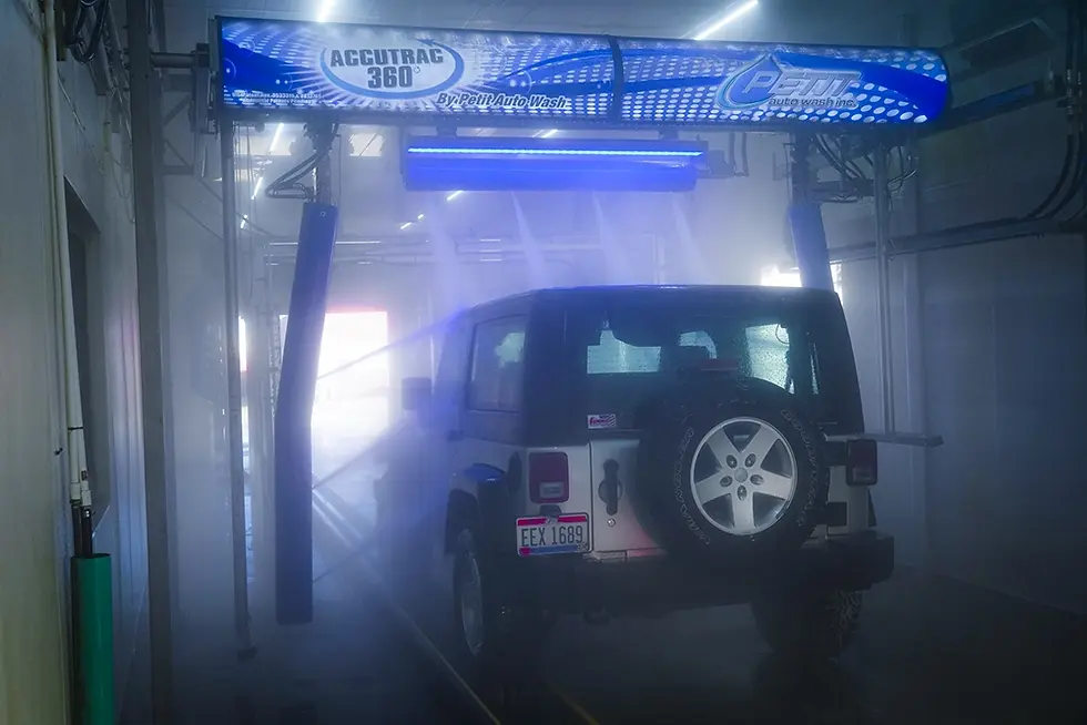 Jeep in automatic car wash at Petit Auto Wash Equipment