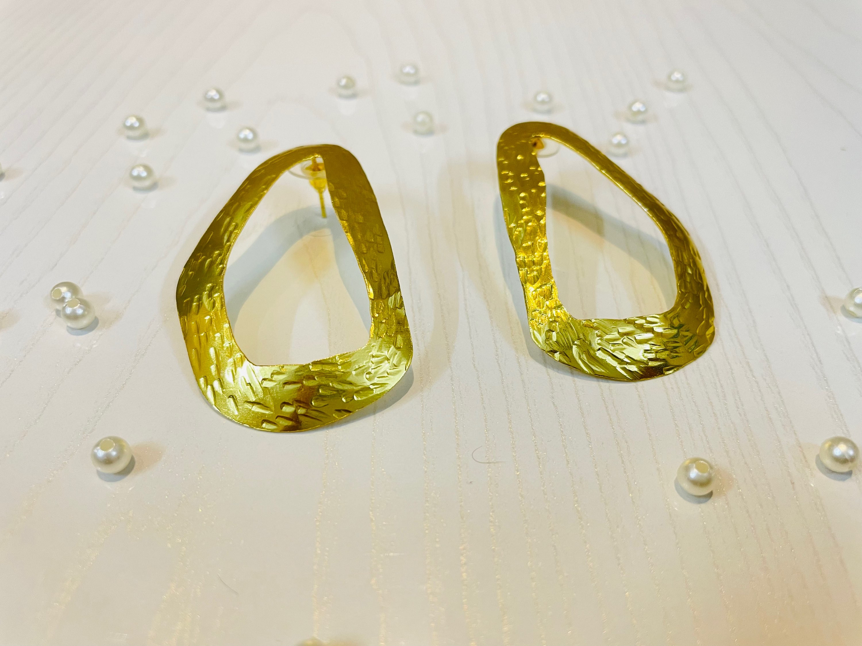 TEXTURED LONG HOOP EARRINGS