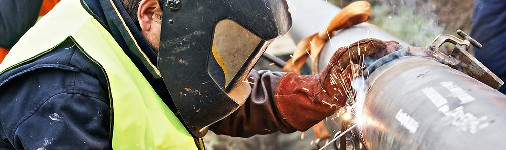 Man Fixing Pipe
